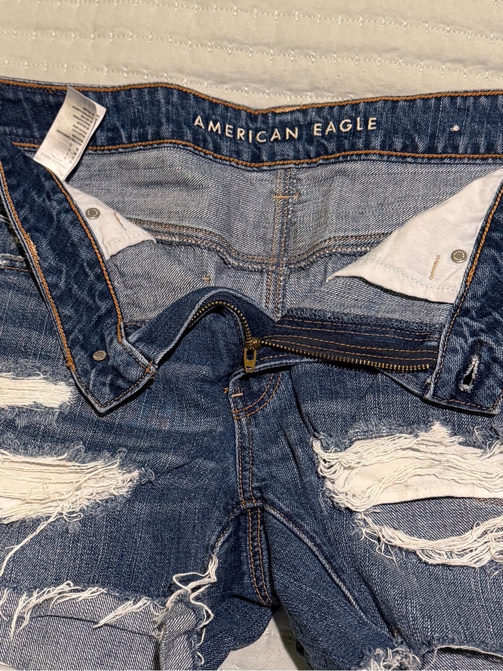 American Age Distressed Dark Blue Denim Shorts with Contrast Stitching